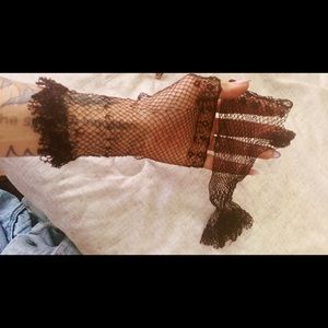 Black fingerless crocheted gloves
